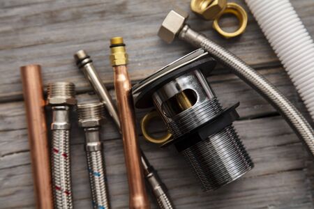 Home improvement background with plumbing tools and equipment