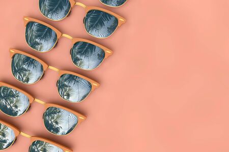 Summer sunglasses with tropical palm tree reflections. 3D Rendering