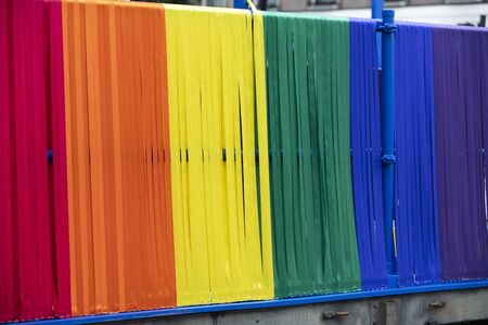 The LGBT gay pride rainbow flag background made los of pieces of ribbon