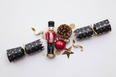 Pulled Christmas cracker full of festive decorationsの写真素材