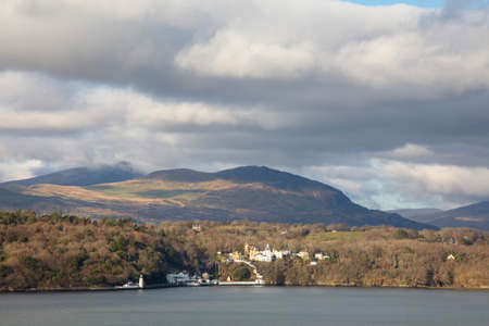 View across an estuary towards Portmerion tourist village in North Walesの写真素材