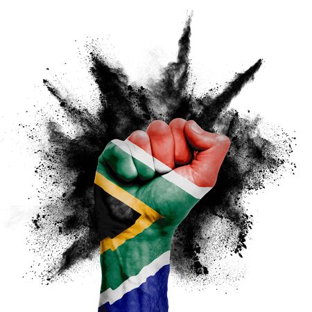 South Africa raised fist with powder explosion, power, protest conceptの写真素材