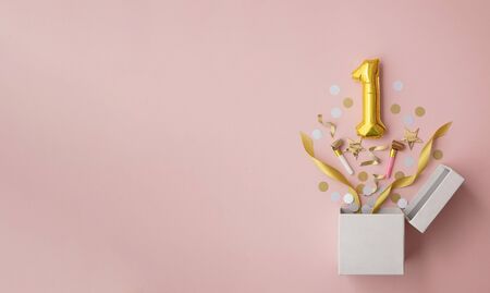 Number 1 birthday balloon celebration gift box lay flat explosionの写真素材