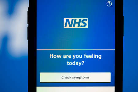 LONDON, UK - April 6th 2020: NHS National health service app on a smartphoneのeditorial素材