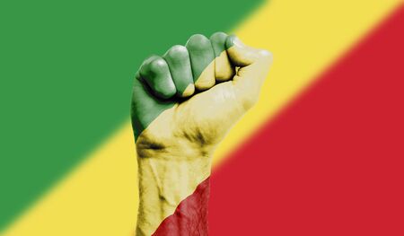 Republic of Congo flag painted on a clenched fist. Strength, Protest conceptの写真素材
