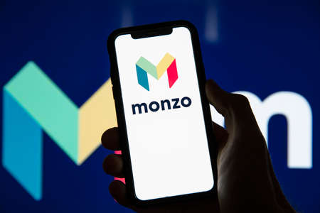 LONDON, UK - June 2020: Monza online financial banking logo on a smartphone