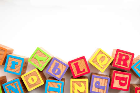 Colourful wooden ABC alphabet baby development blocksの写真素材