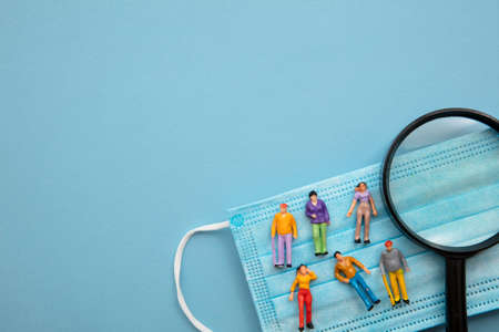 Covid health investigation. People on a mask and magnifying glass