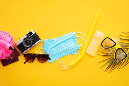 new normal summer travel background with face maskの写真素材