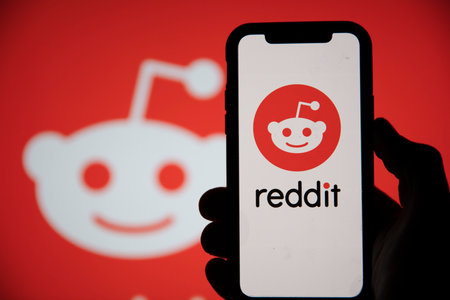 LONDON, UK - February 2021: Reddit logo displayed on a smartphone deviceのeditorial素材