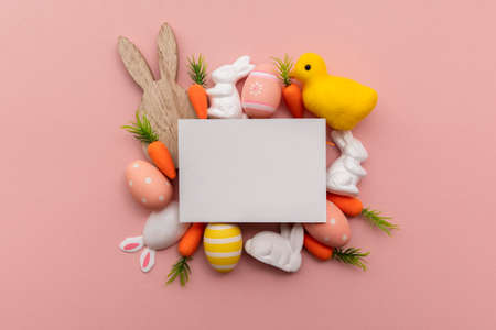 Blank easter greeting card with easter bunny and egg decorationsの写真素材