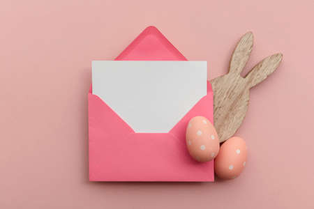 Easter blank card and envelope with easter bunny and eggsの写真素材