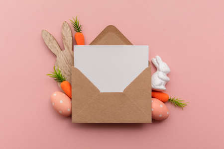 Easter blank card and envelope with easter bunny and eggsの写真素材
