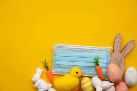 Happy easter background with easter bunny and eggs during  pandemic