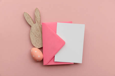 Easter blank card and envelope with easter bunny and eggsの写真素材