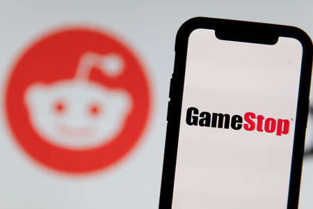 LONDON, UK - February 2021: Smartphone showing Gamestop by a redditのeditorial素材