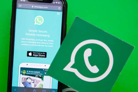 LONDON, UK - March 2021: Whatsapp online messaging service logo on a smartphoneのeditorial素材