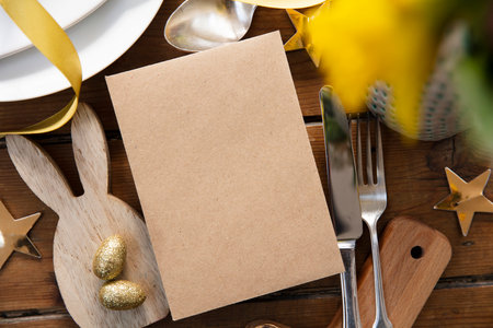 Happy easter celebration background. Decorated table with blank menu
