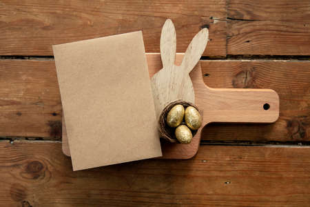 Easter celebration meal table layout with a blank menuの写真素材