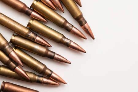 A group of bullet ammunition shells on a white background