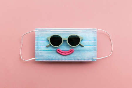 UnhappyHappy face character made from a medical protective face mask