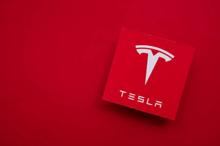 LONDON, UK - June 2021: Tesla electric vehicle and clean energy logoのeditorial素材