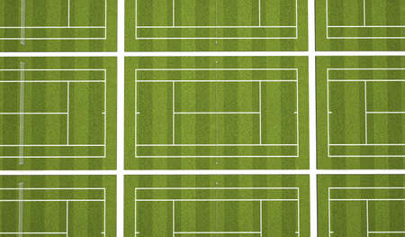 Overhead grass tennis court with white markings and net. 3D Rendering
