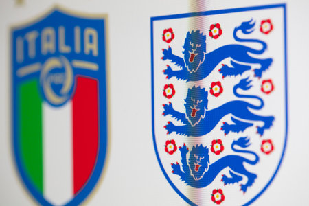 LONDON, UK - July 2021: England and Italy national football team badgesのeditorial素材