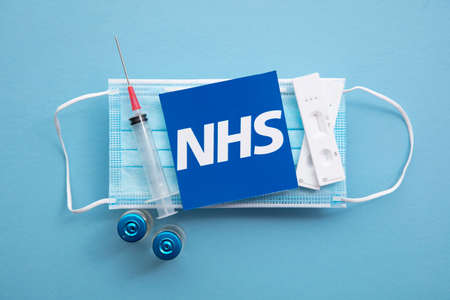 LONDON, UK - July 2021: NHS NAtional health service covid vaccine backgroundのeditorial素材