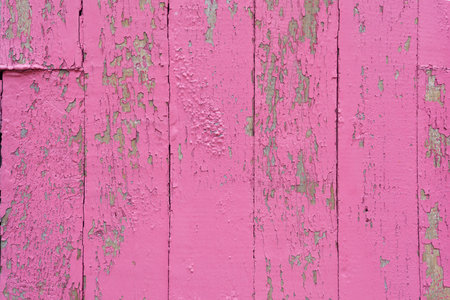 Colourful distressed wooden texture background painted pinkの写真素材