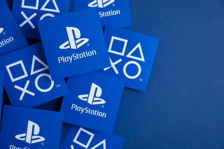 LONDON, UK - July 2022: Sony playstation logo against a blue background. Playstation is a video game...