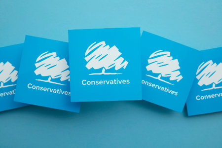 LONDON, UK - July 2022: Conservative United Kingdom political party against a blue backgroundのeditorial素材