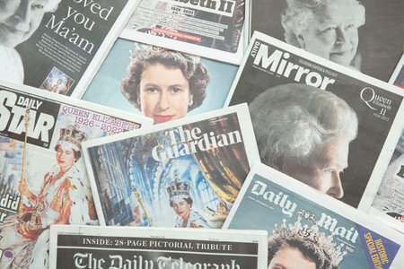 LONDON, UK - September 2022: Front covers of national newspapers pay tribute to the Queen after her deathのeditorial素材