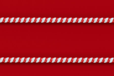 Christmas candy cane red and white striped frame. Festive striped candy. 3D Renderingの写真素材