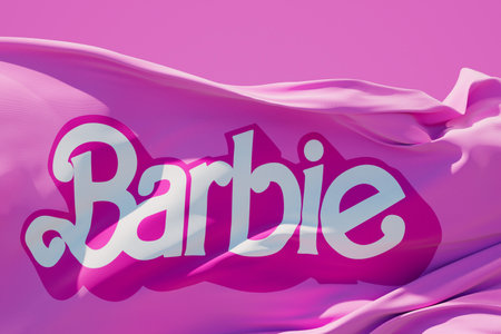 LONDON, UK - July 2023: Barbie doll logo on a flag. Barbie is a fashion doll made by Mattel. 3D Renderingのeditorial素材