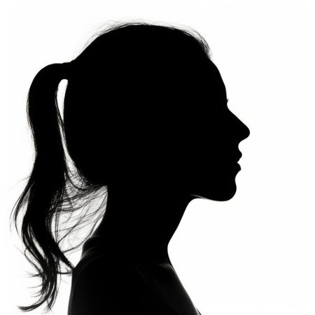 Silhouette of a young woman. Anonymous profile portrait picture. Social media avatarの素材