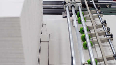 Enterprise for the production of cardboard containers .Cardboard manufacturing layering rollers roll...
