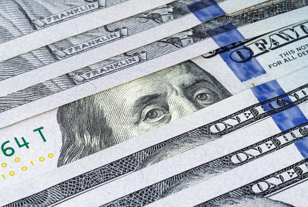 Row of US hundred dollar banknotes closeupの写真素材