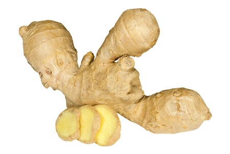 Ginger root with cutting slices on white backgroundの写真素材