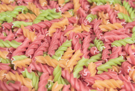 Raw pasta fusilli. Food and culinary