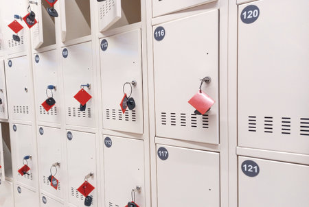 Cells with keys for storing small items in a supermarket. Retail store equipment