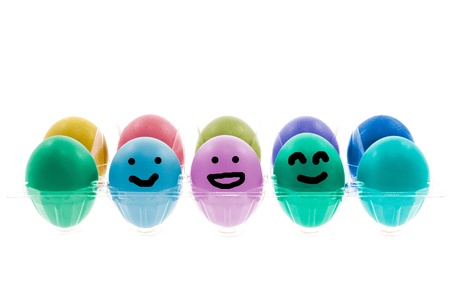Colorful Easter eggs with different smile on their faces の写真素材