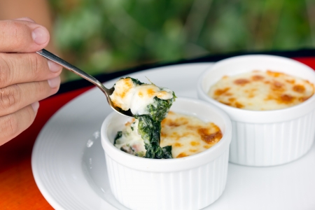 Baked spinach with cheeseの写真素材