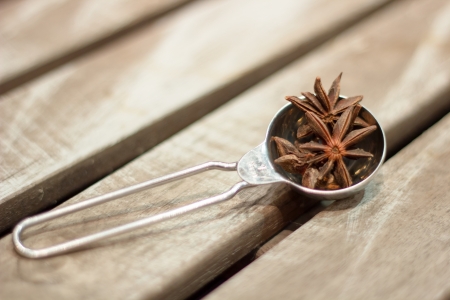 Star anise was placed on top of the wooden boardの写真素材