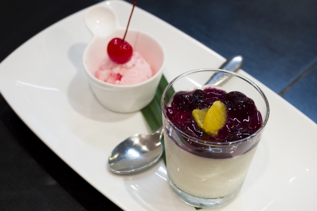 smoothie yogurt and ice-cream with cherry maraschino on topの写真素材
