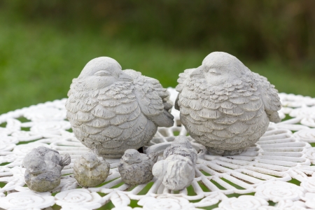 Decorative Bird, family concept on the tableの写真素材