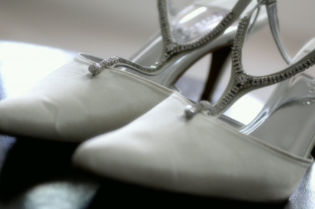 Close up of a white wedding heelsの素材