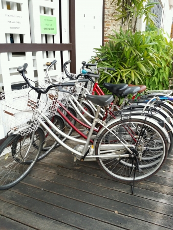 Rows of bicycles for rent beside malacca river bankの素材