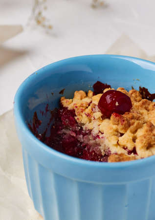 cherry crumble with a spoon delicious