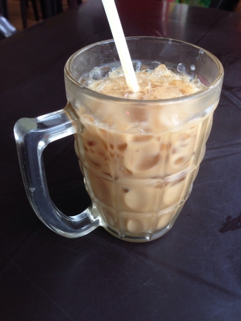 Ice coffee served in glass cup with strawの素材